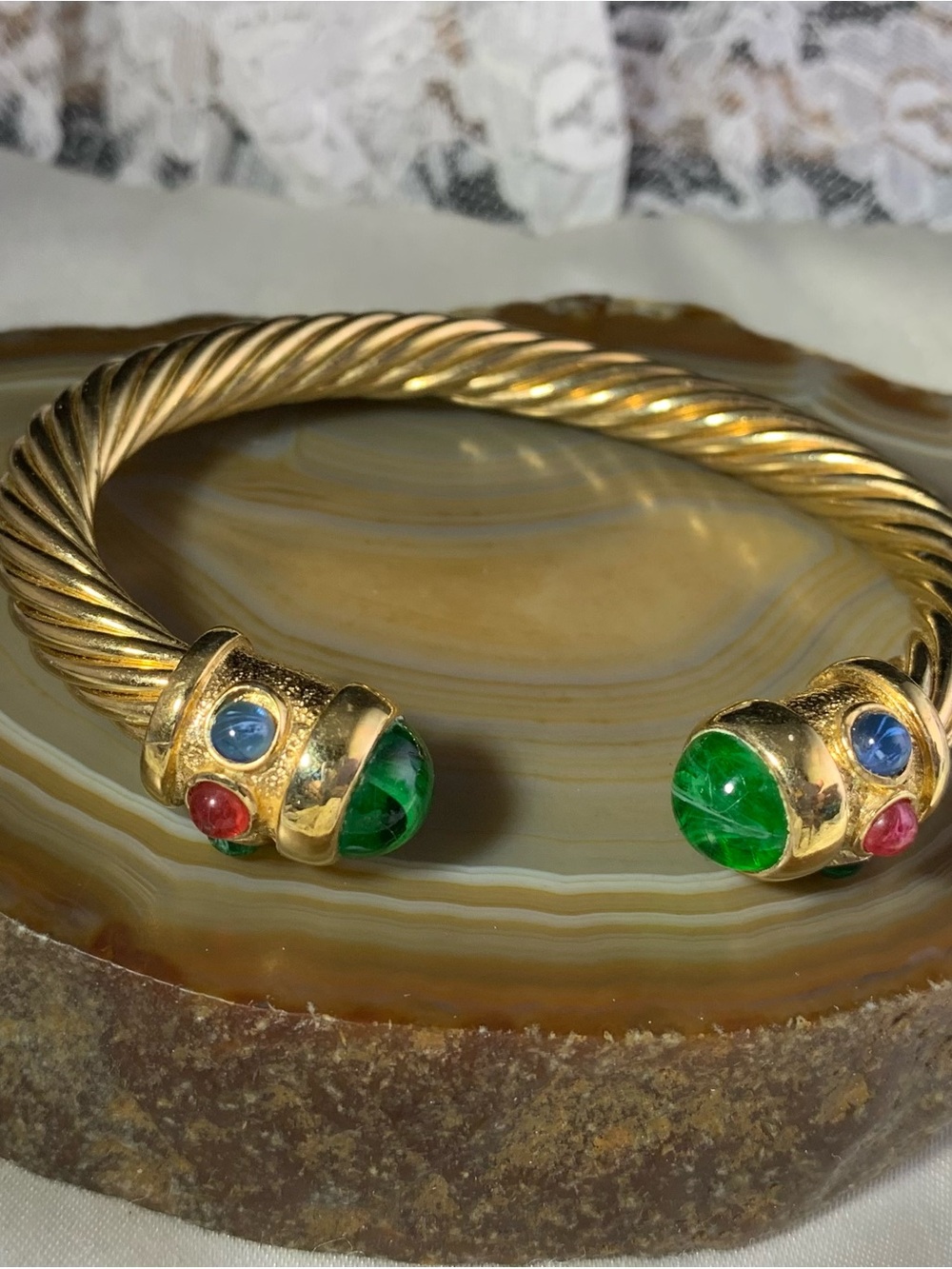 Gold Plated Cable Cuff Bracelet with Multi colored Cab's and Emerald Green Ends.